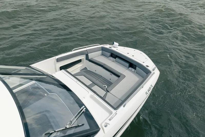 Slide: The Image of 2023 Galeon 325 GTO boat with sleek seating on open water. - 32
