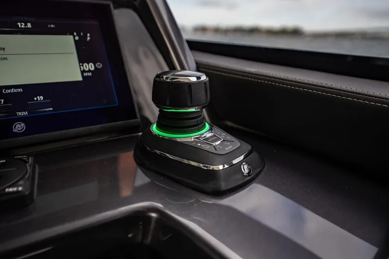 Slide: The Image of Control panel of 2023 Galeon 325 GTO yacht with joystick and digital display. - 40