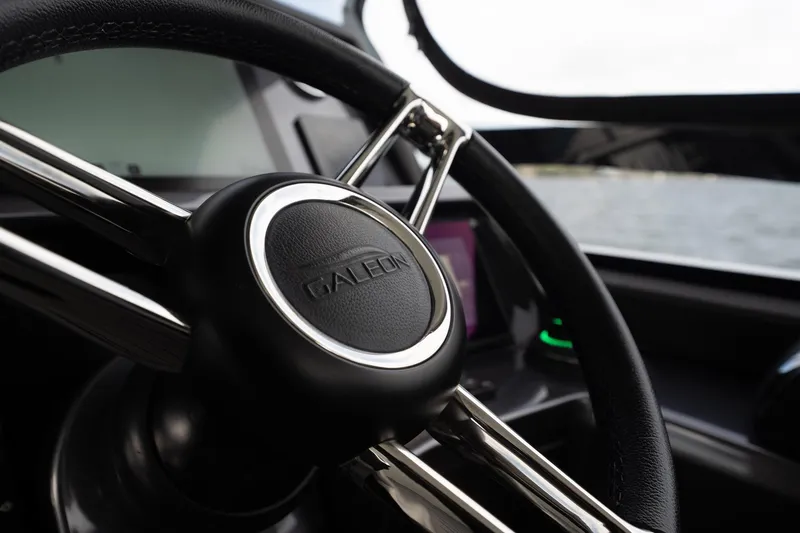 Slide: The Image of Steering wheel of 2023 Galeon 325 GTO yacht, featuring sleek design and modern controls. - 43