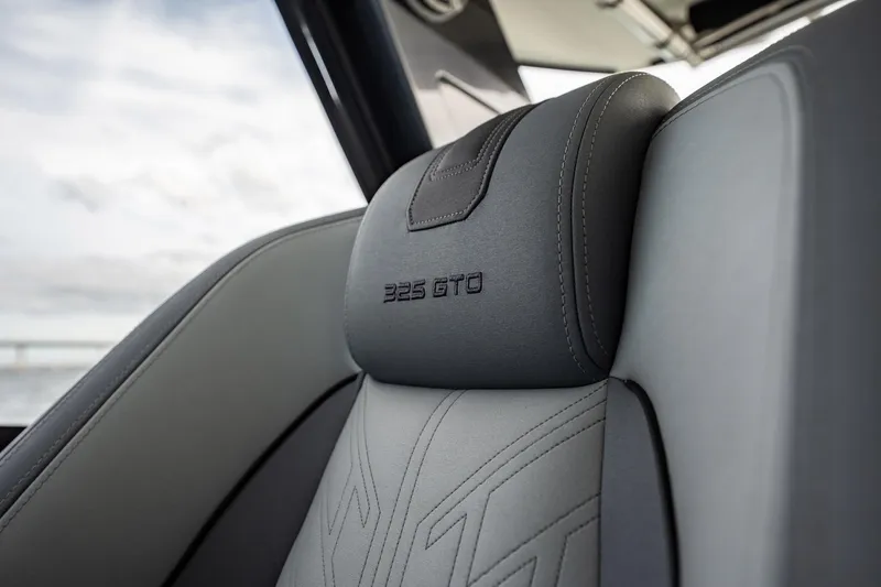 Slide: The Image of 2023 Galeon 325 GTO interior seat detail with embroidered logo. - 44