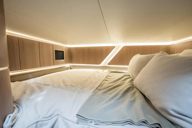 Slide: The Image of Luxurious cabin interior of 2023 Galeon 325 GTO yacht with cozy bedding. - 45