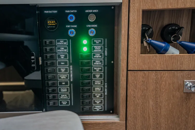 Slide: The Image of Control panel of 2023 Galeon 325 GTO yacht with switches and indicators. - 53