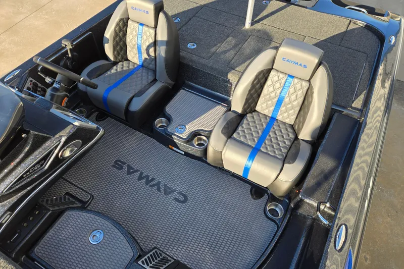 Slide: The Image of 2027 Caymas 201 Pro boat interior with stylish seats and modern design. - 10