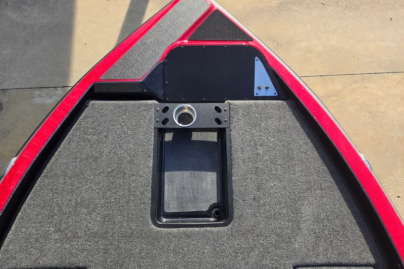 Slide: The Image of Bow deck of 2027 Caymas 201 Pro boat, gray carpet, red accents. - 14