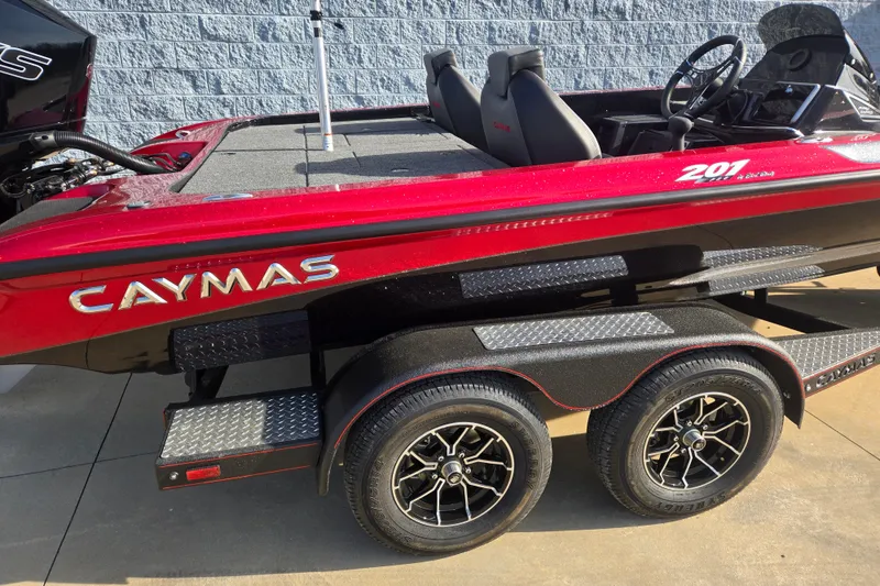Slide: The Image of Red Caymas 201 Pro boat from 2027 on trailer. - 19