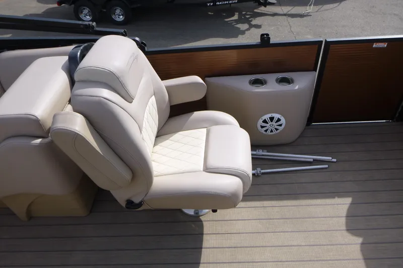 Slide: The Image of Luxurious seating on 2018 Bennington 24 SSRX boat with cup holders and speaker. - 13