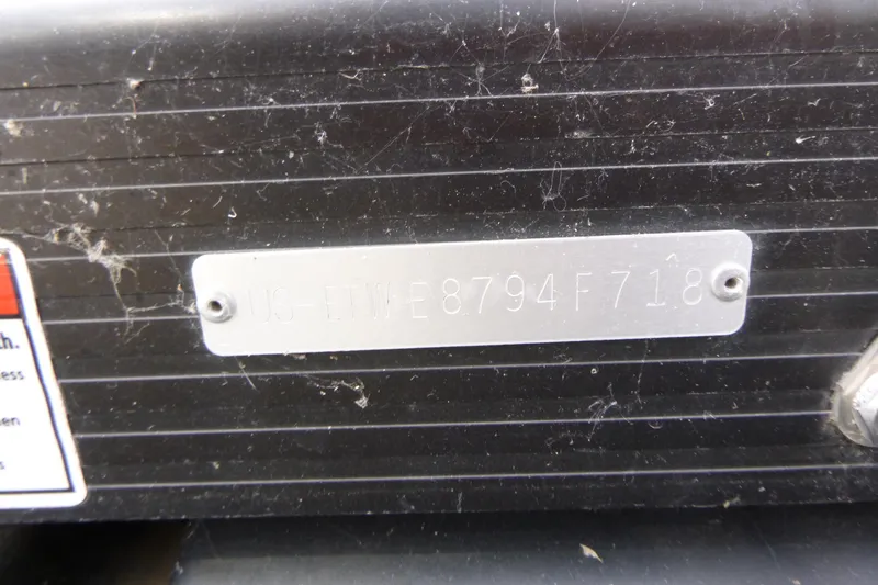 Slide: The Image of Hull identification number on a 2018 Bennington 24 SSRX boat. - 18