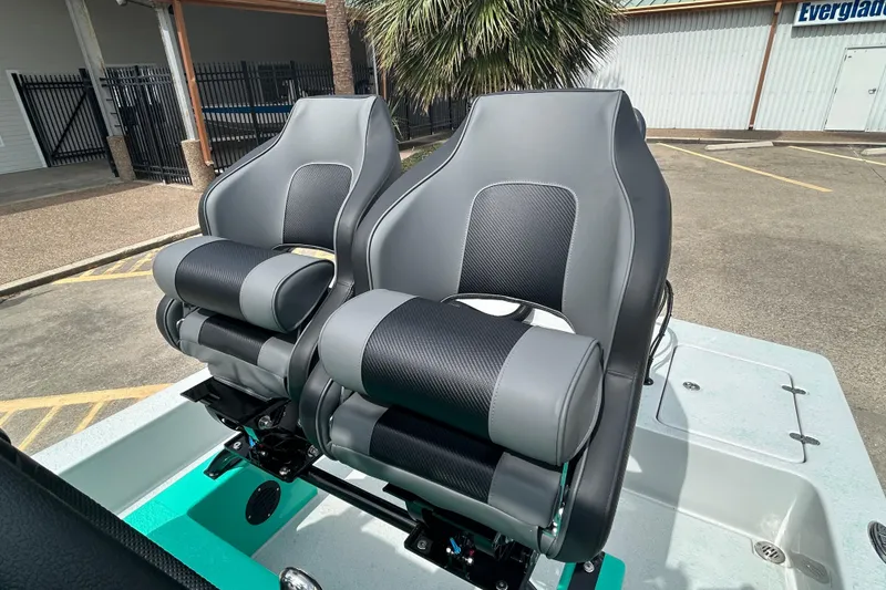 Slide: The Image of Luxury seating on 2026 Gulf Coast Saber Cat boat, featuring sleek design and premium materials. - 13