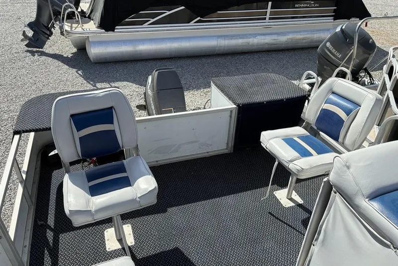 Slide: The Image of 2001 Leisure Kraft 20 Fish and Cruise boat interior with blue and white seating. - 4