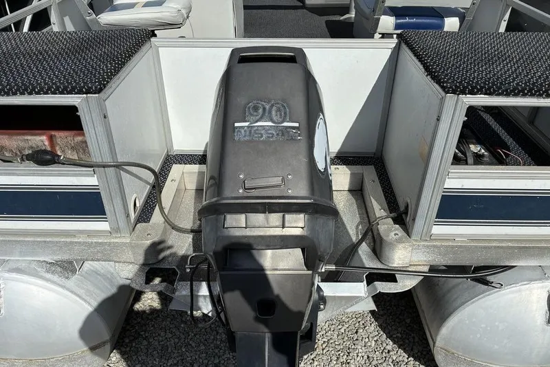 Slide: The Image of 2001 Leisure Kraft 20 Fish and Cruise pontoon boat engine detail. - 5