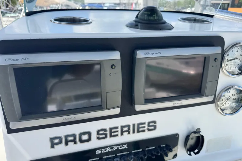 Slide: The Image of Console of 2008 Sea Fox 216 Center Console with Garmin GPSmap 740s displays. - 13