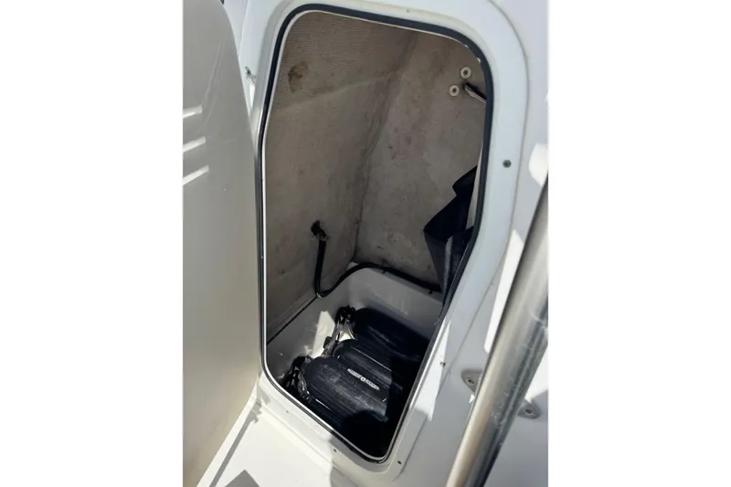 Slide: The Image of Storage compartment inside a 2008 Sea Fox 216 Center Console boat. - 14