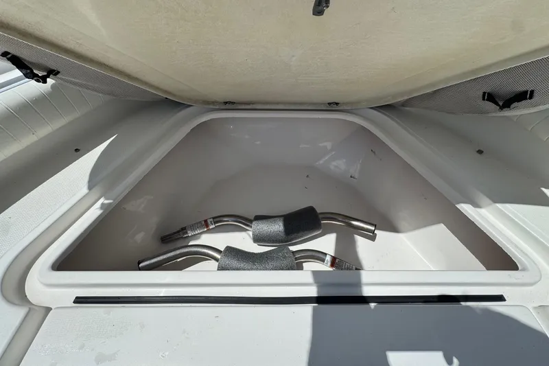 Slide: The Image of Storage compartment of a 2008 Sea Fox 216 Center Console boat, open and empty. - 7
