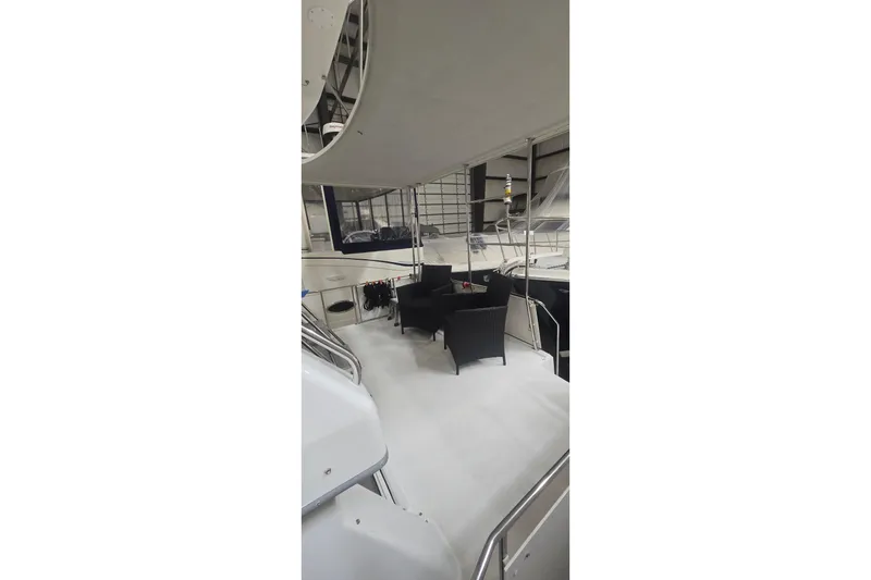 Slide: The Image of 1999 Carver 326 Aft Cabin Motor Yacht interior with seating area. - 17