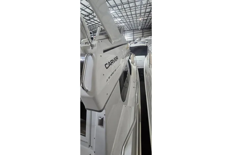 Slide: The Image of 1999 Carver 326 Aft Cabin Motor Yacht in storage, side view. - 2