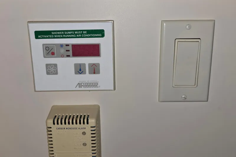 Slide: The Image of Control panel and switch on 1999 Carver 326 Aft Cabin Motor Yacht. - 44