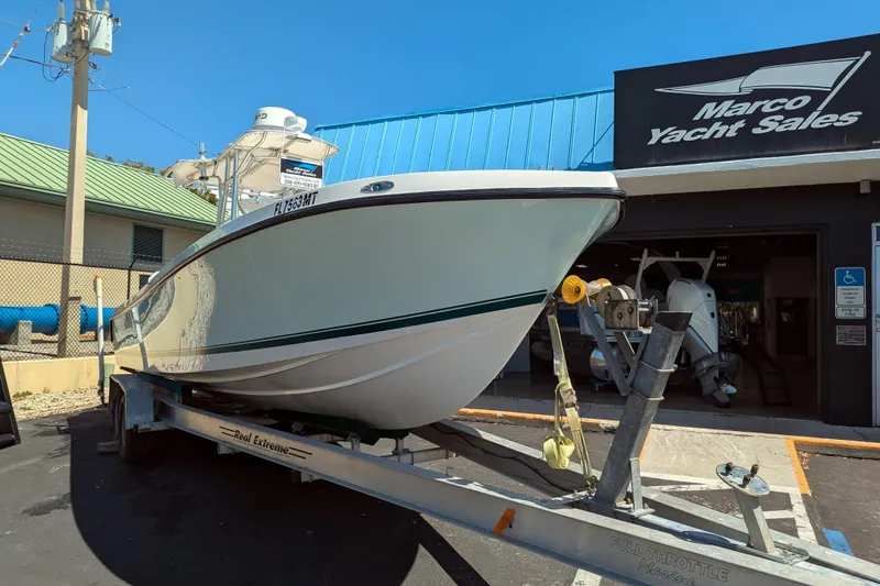 The Image of 2005 SeaVee 290B boat on trailer at Marco Yacht Sales dealership. - 0