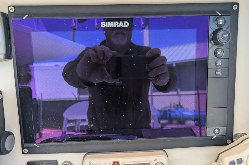 Slide: The Image of Icom VHF marine radio IC-M402S on 2005 SeaVee 290B boat dashboard. - 10