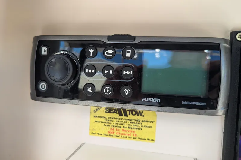 Slide: The Image of Fusion MS-IP600 marine stereo on 2005 SeaVee 290B boat dashboard. - 13