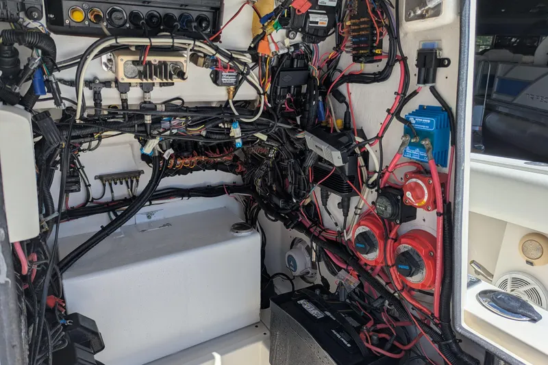 Slide: The Image of Electrical wiring and components inside a 2005 SeaVee 290B boat. - 17