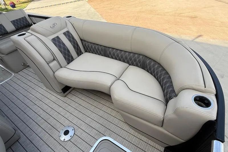 Slide: The Image of Luxurious seating on 2022 Barletta LUSSO 25UEA pontoon boat with cup holders and elegant design. - 14