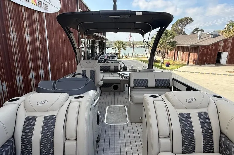 Slide: The Image of 2022 Barletta LUSSO 25UEA pontoon boat with luxurious seating and modern design. - 15