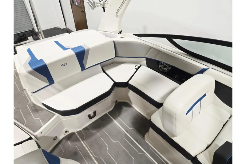Slide: The Image of 2020 Regal 2000 ESX Bowrider interior with white and blue seating, modern design. - 7