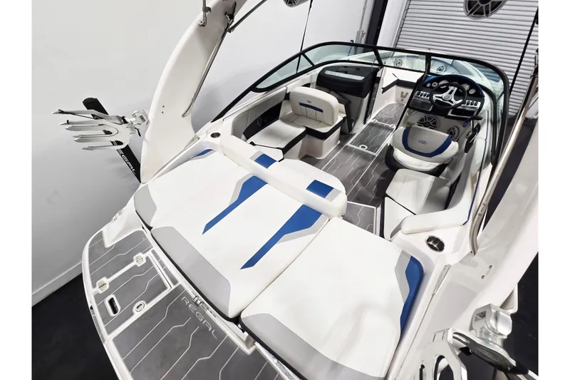 Slide: The Image of 2020 Regal 2000 ESX Bowrider interior with modern seating and sleek dashboard design. - 8