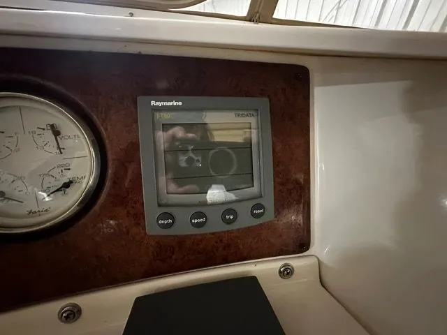 Slide: The Image of Raymarine display and instruments on 2002 Silverton 39 Motor Yacht. - 17