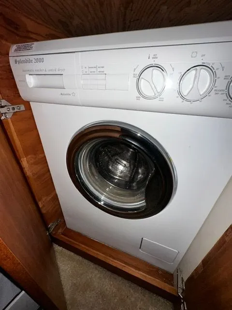 Slide: The Image of Splendide 2000 washer in 2002 Silverton 39 Motor Yacht. - 29