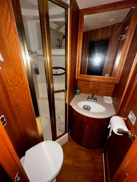 Slide: The Image of Interior of 2002 Silverton 39 Motor Yacht bathroom. - 30