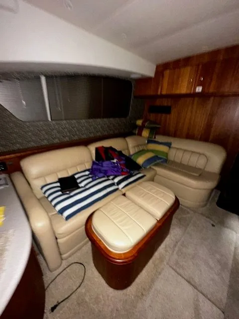 Slide: The Image of Interior of a 2002 Silverton 39 Motor Yacht with leather sofas. - 31