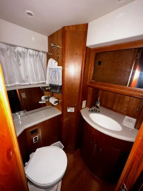 Slide: The Image of Interior view of 2002 Silverton 39 Motor Yacht bathroom. - 35