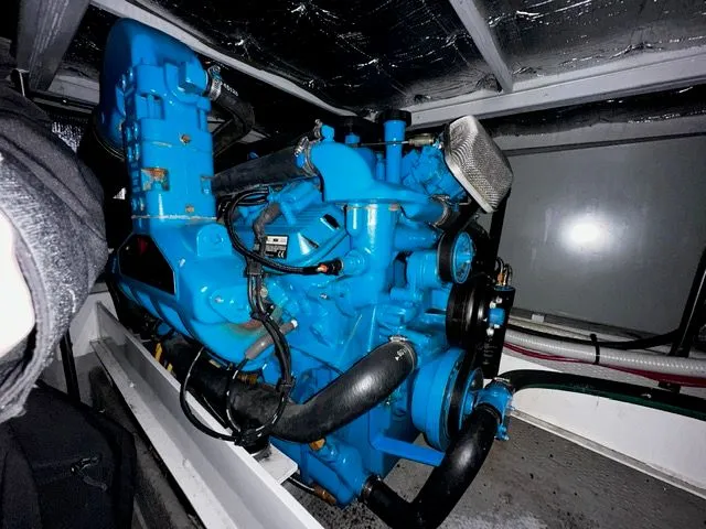 Slide: The Image of Engine room of 2002 Silverton 39 Motor Yacht, blue engine. - 39