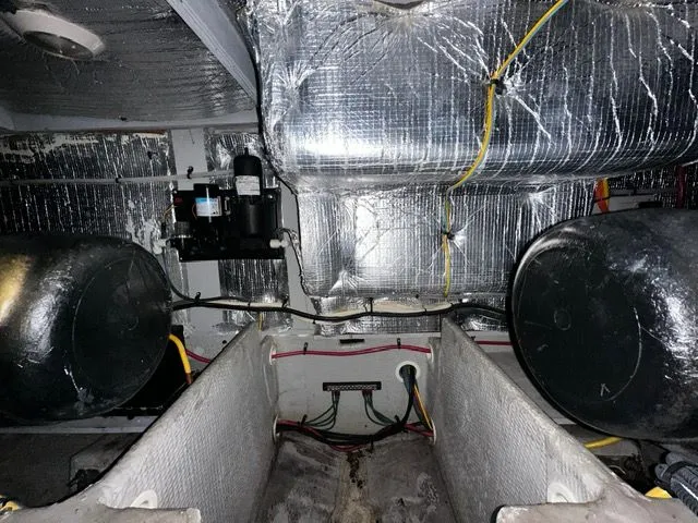 Slide: The Image of Engine room of a 2002 Silverton 39 Motor Yacht with insulation. - 40
