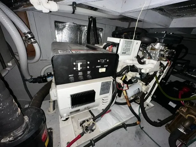 Slide: The Image of Engine room of 2002 Silverton 39 Motor Yacht with generator. - 45
