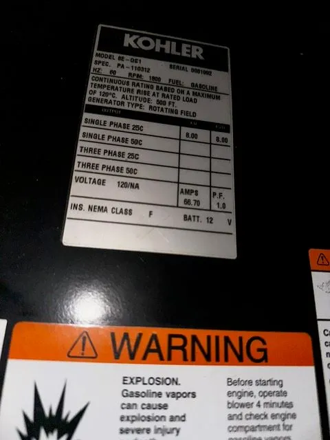 Slide: The Image of Kohler generator specifications and warning labels on Silverton 39 Motor Yacht. - 46