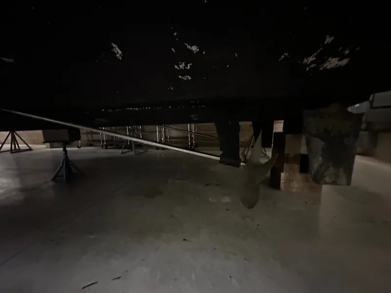 Slide: The Image of Underside of a 2002 Silverton 39 Motor Yacht in dry dock. - 6