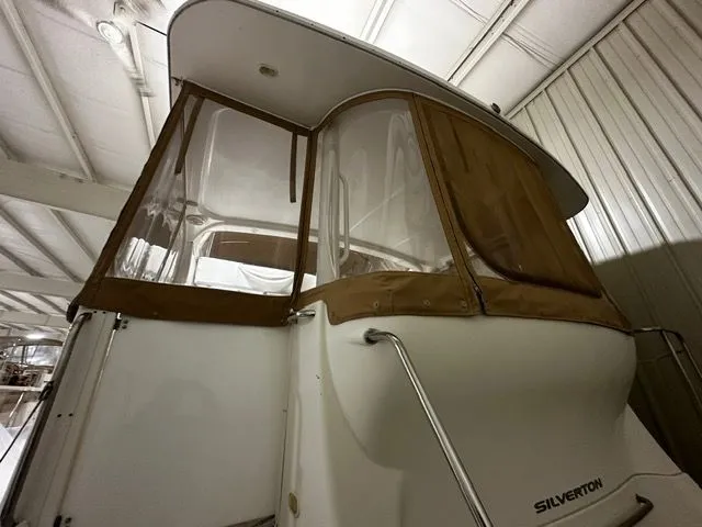 Slide: The Image of 2002 Silverton 39 Motor Yacht in storage, side view. - 8