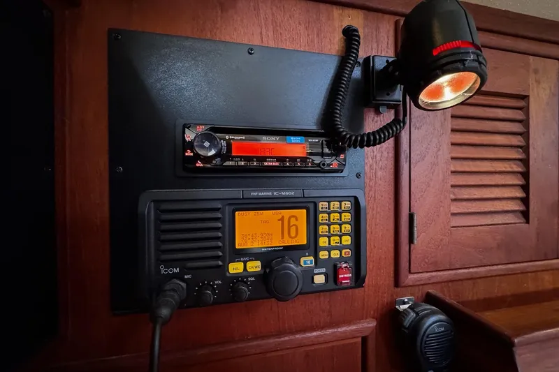 Slide: The Image of Control panel of a 1998 Island Packet 350 sailboat with generator and tank indicators. - 31