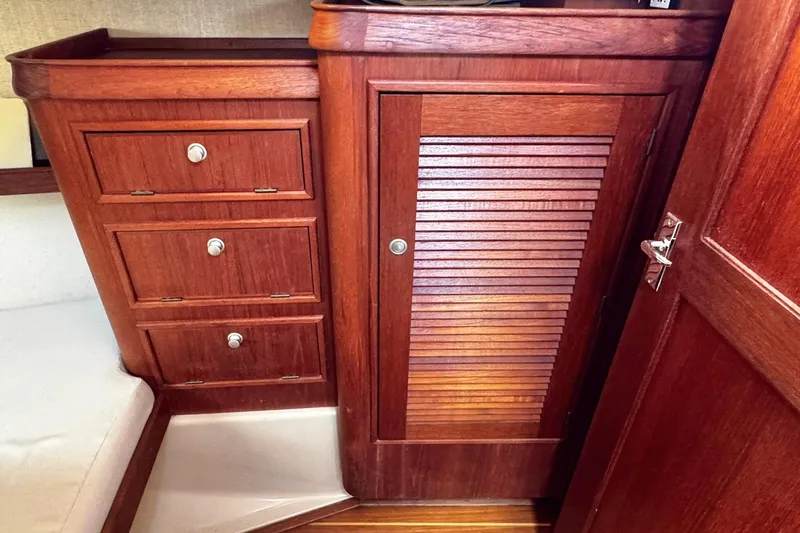 Slide: The Image of Interior of 1998 Island Packet 350 yacht bathroom with shower and porthole window. - 43