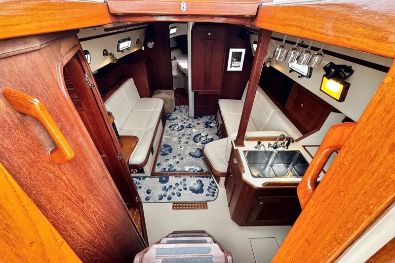 Slide: The Image of Wooden hatch door on a 1998 Island Packet 350 sailboat cockpit. - 6