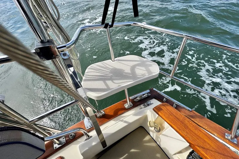 Slide: The Image of Control panel on a 1998 Island Packet 350 sailboat with radio and navigation display. - 64