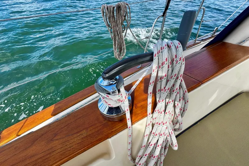 Slide: The Image of Control panel of a 1998 Island Packet 350 sailboat with gauges and switches. - 67