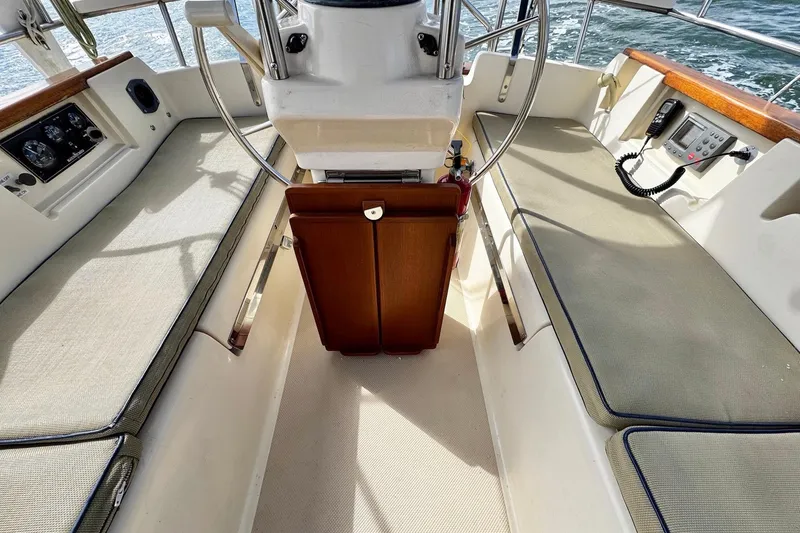 Slide: The Image of Instrument panel of a 1998 Island Packet 350 yacht showing RPM, temperature, and oil gauges. - 68