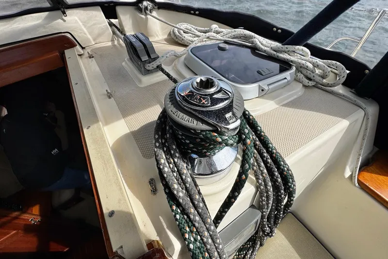 Slide: The Image of Raytheon display on 1998 Island Packet 350 sailboat, showing navigation data. - 73