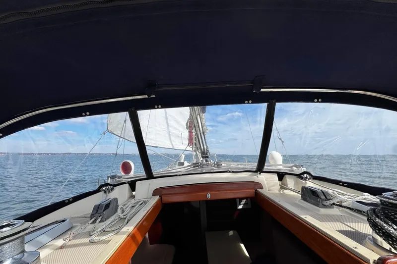 Slide: The Image of Deck of 1998 Island Packet 350 sailboat with winch and ropes. - 75