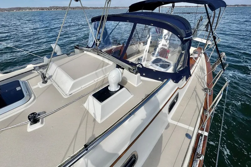 Slide: The Image of Cockpit of 1998 Island Packet 350 sailboat with seating and ocean view. - 84
