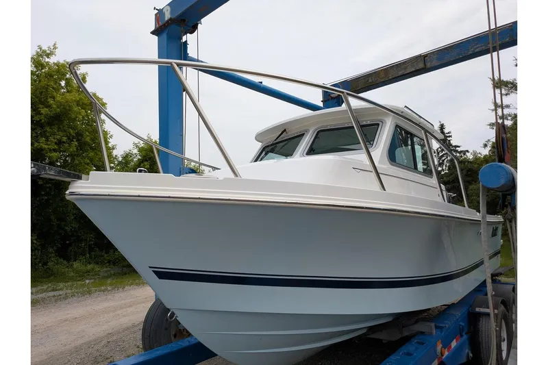 The Image of 2026 Parker 227 Explorer boat on trailer, ready for launch. - 0