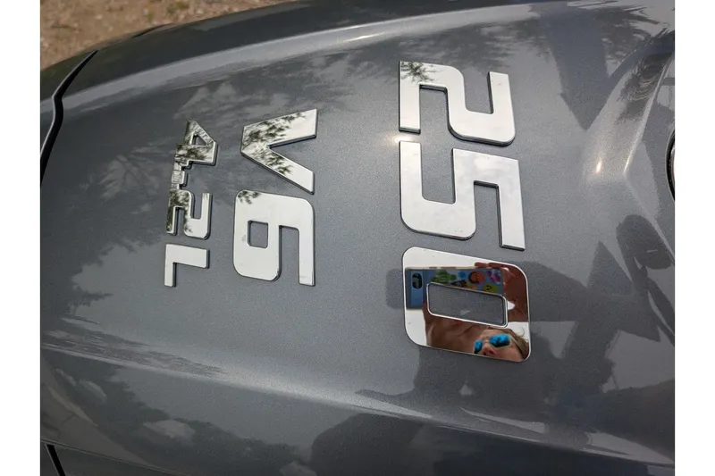 Slide: The Image of Close-up of Parker 227 Explorer 2026 engine cover with V6 4.2L badge. - 7